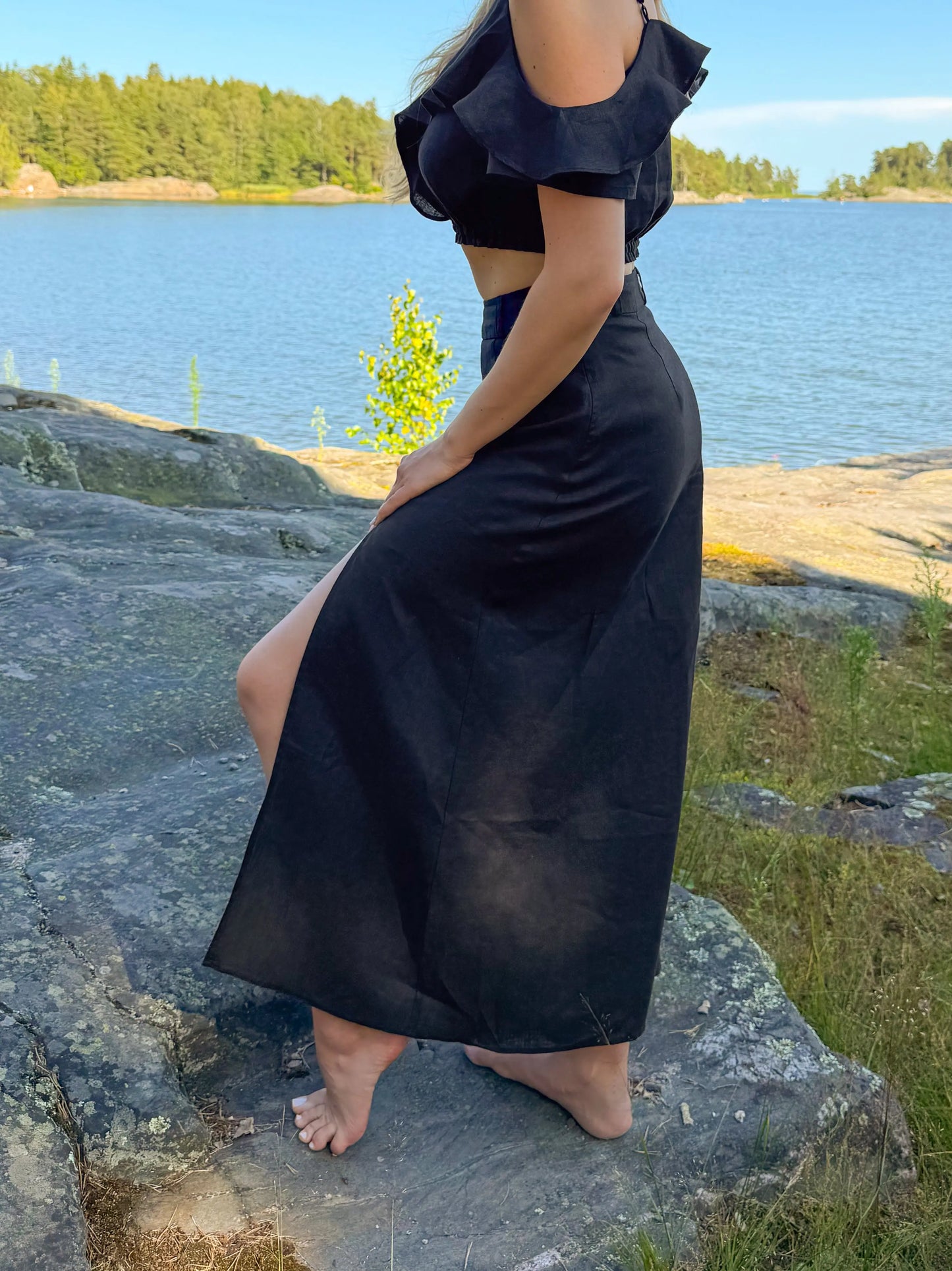 Pure linen, high waisted black skirt with a stylish thigh slit for breathable comfort and effortless elegance for Australian summer style