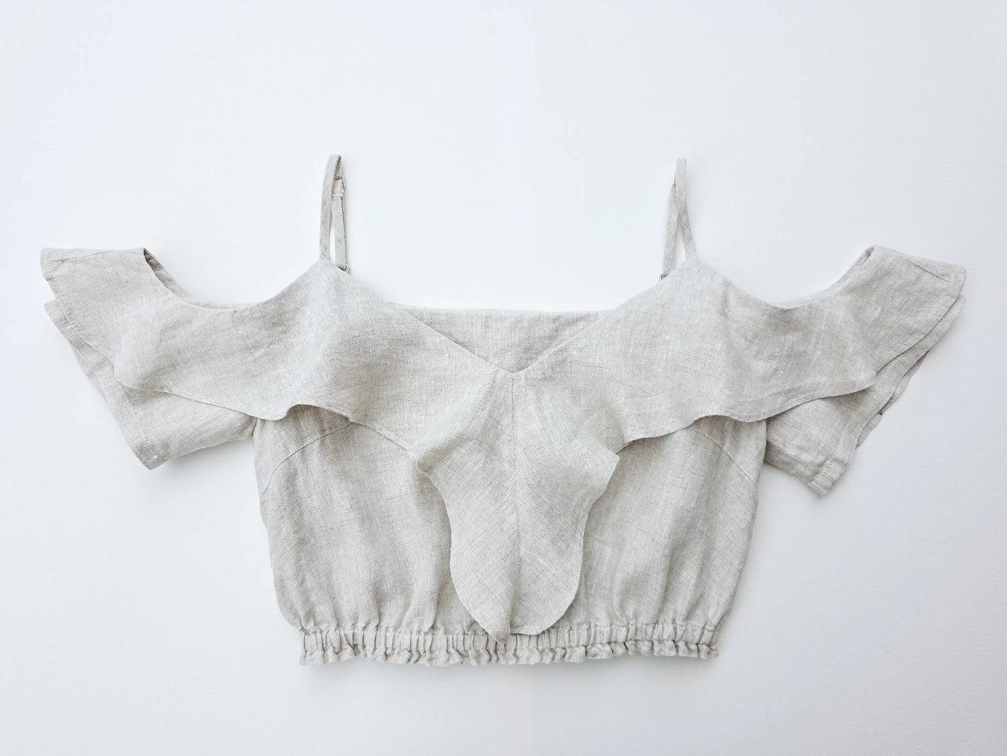 100% pure natural flax linen ruffle crop top in a refined natural texture.