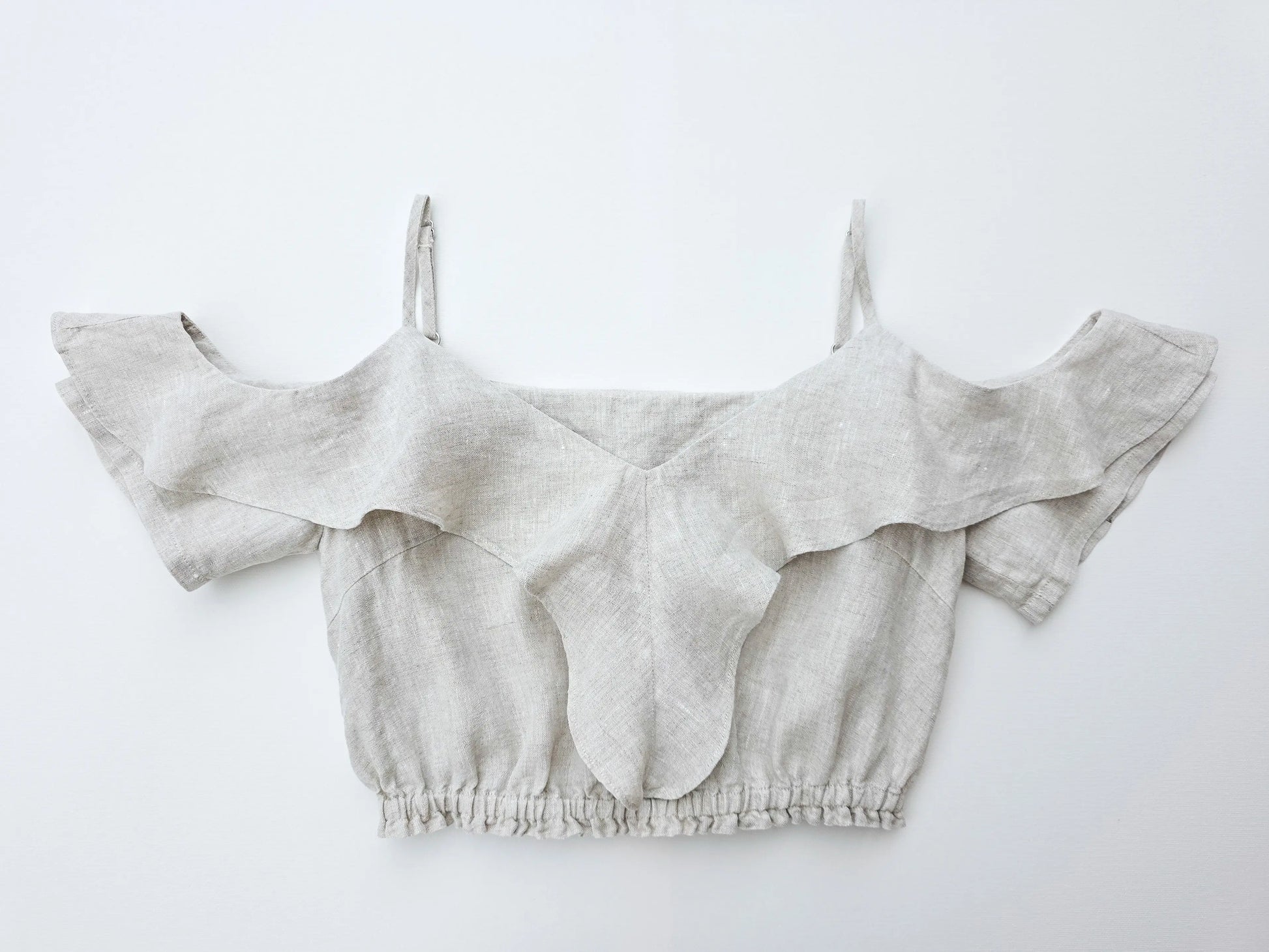 100% pure natural flax linen ruffle crop top in a refined natural texture.