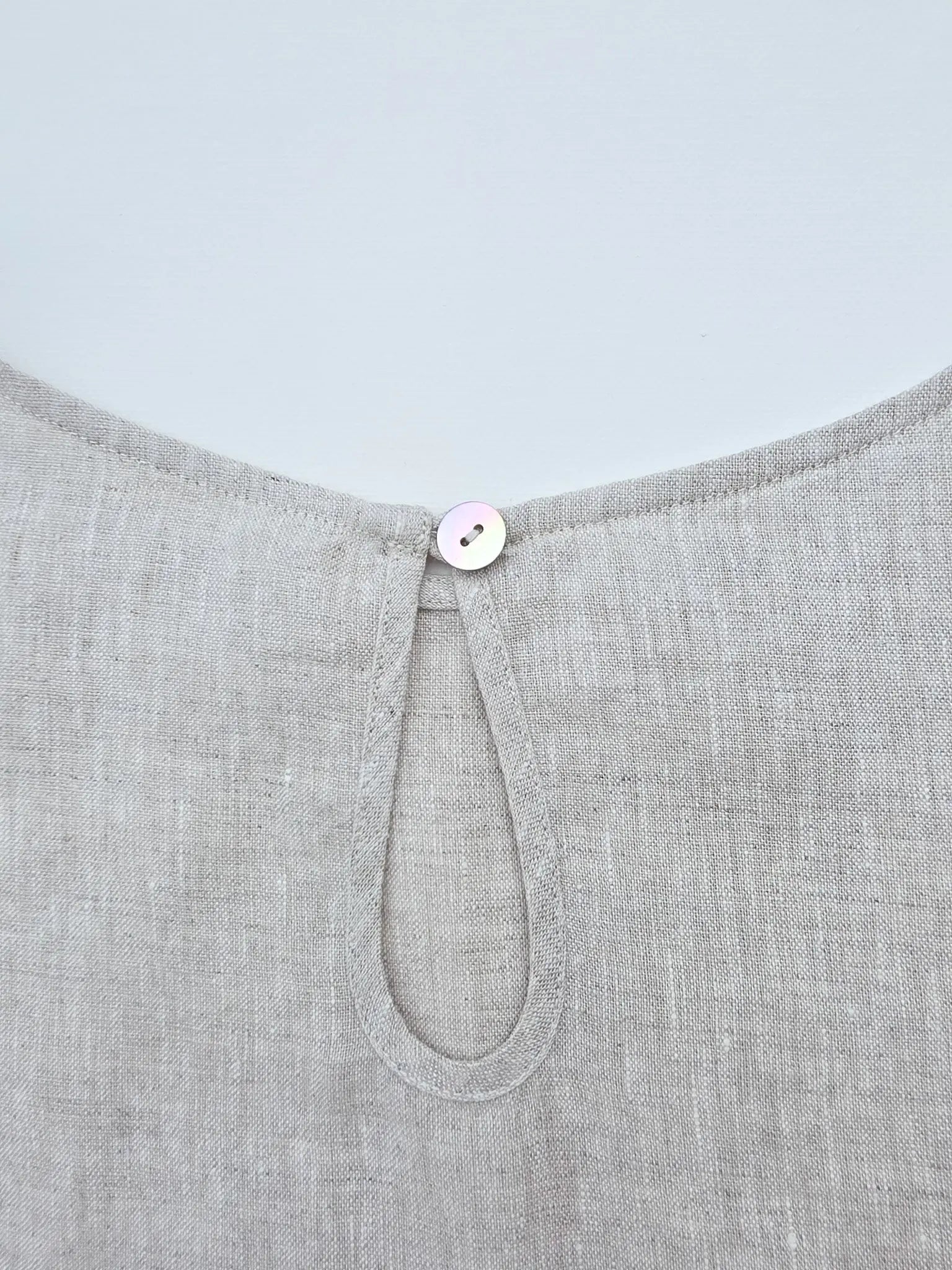 Women's linen dress in beige. Natural fibres for best summer outfits. Casual comfortable linen style. 