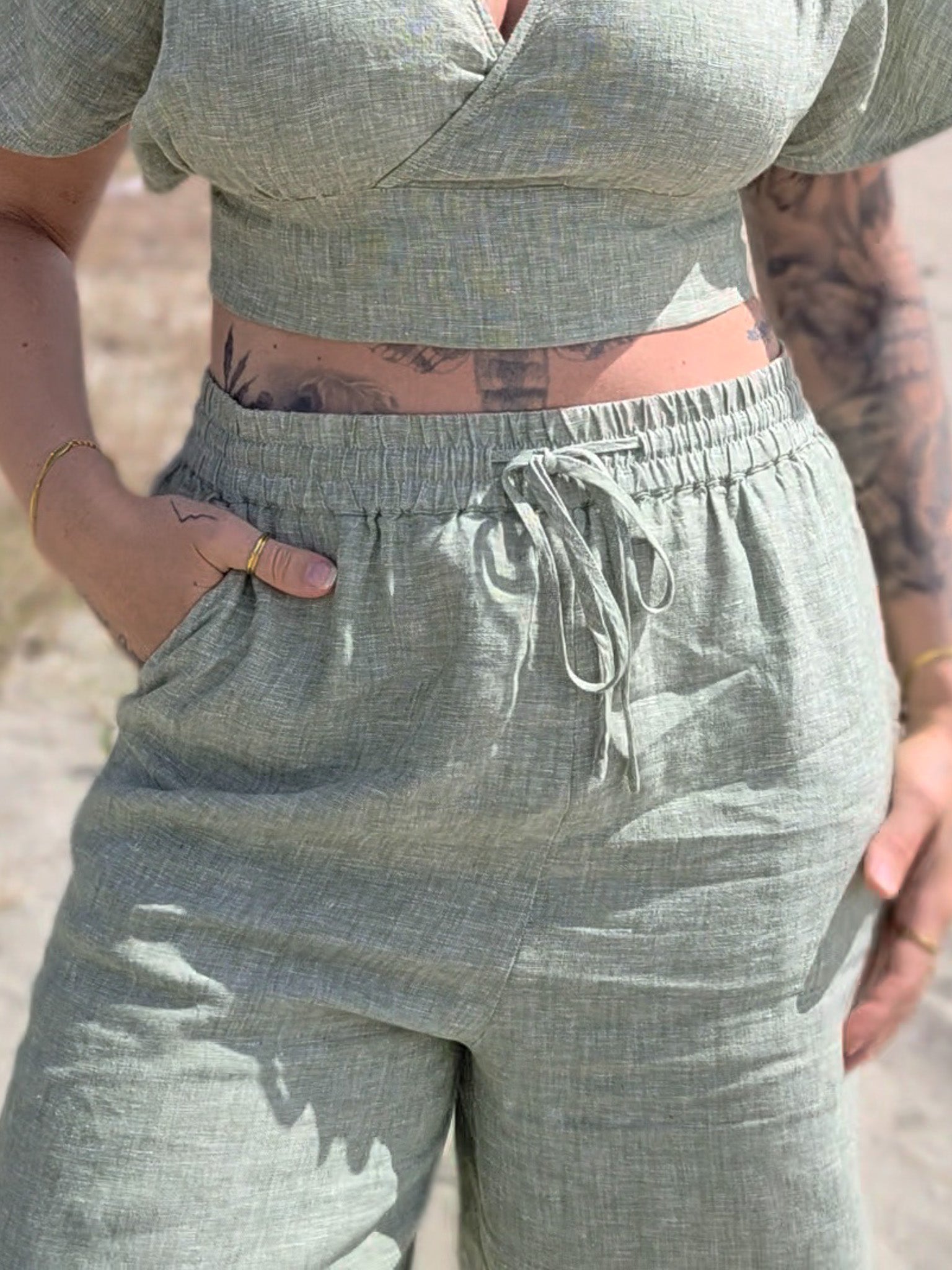 Sage green high waisted pants for women. Pastel colour linen clothing for cutest summer outfits. Comfortable linen clothing Australia