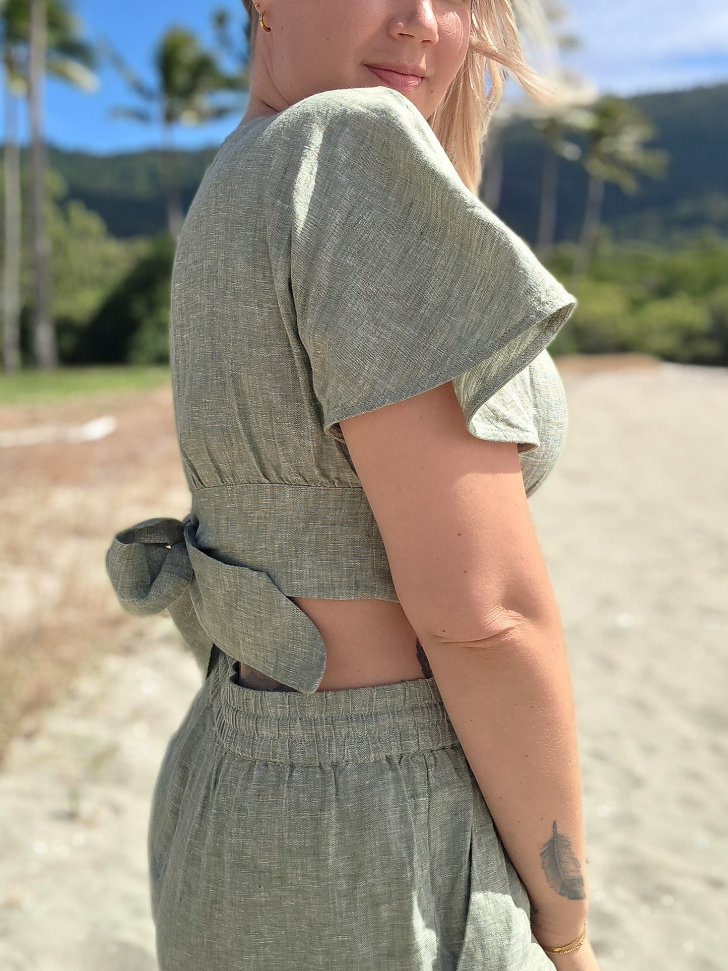 Pure linen clothing for elegant summer look. Light green colour for soft feminine style. 
