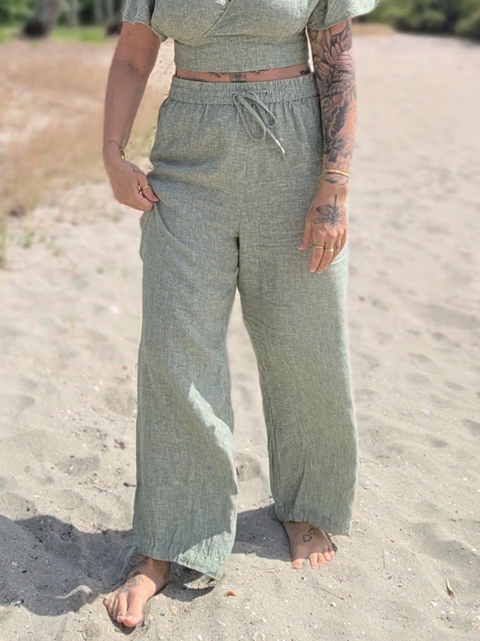 Beautiful sage green 100% linen style. Lightweight summer style for beach and everyday wear. 