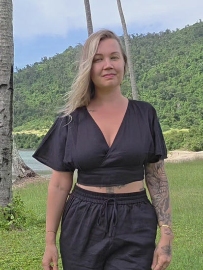 ALKU clothing - Black linen cropped top. Short sleeve linen shirt for women. V-neck design and open back detail for feminine silhouette. 